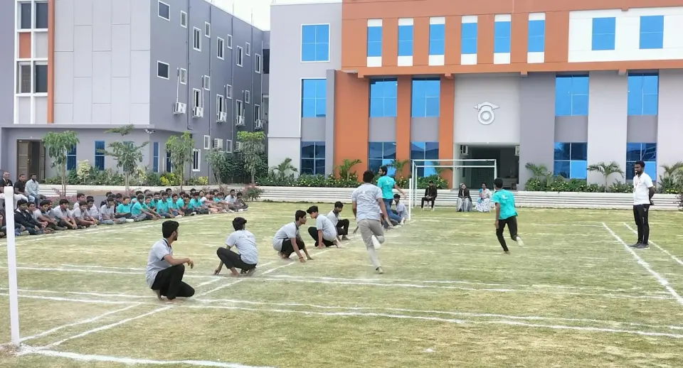 Students playing kho-kho on the field