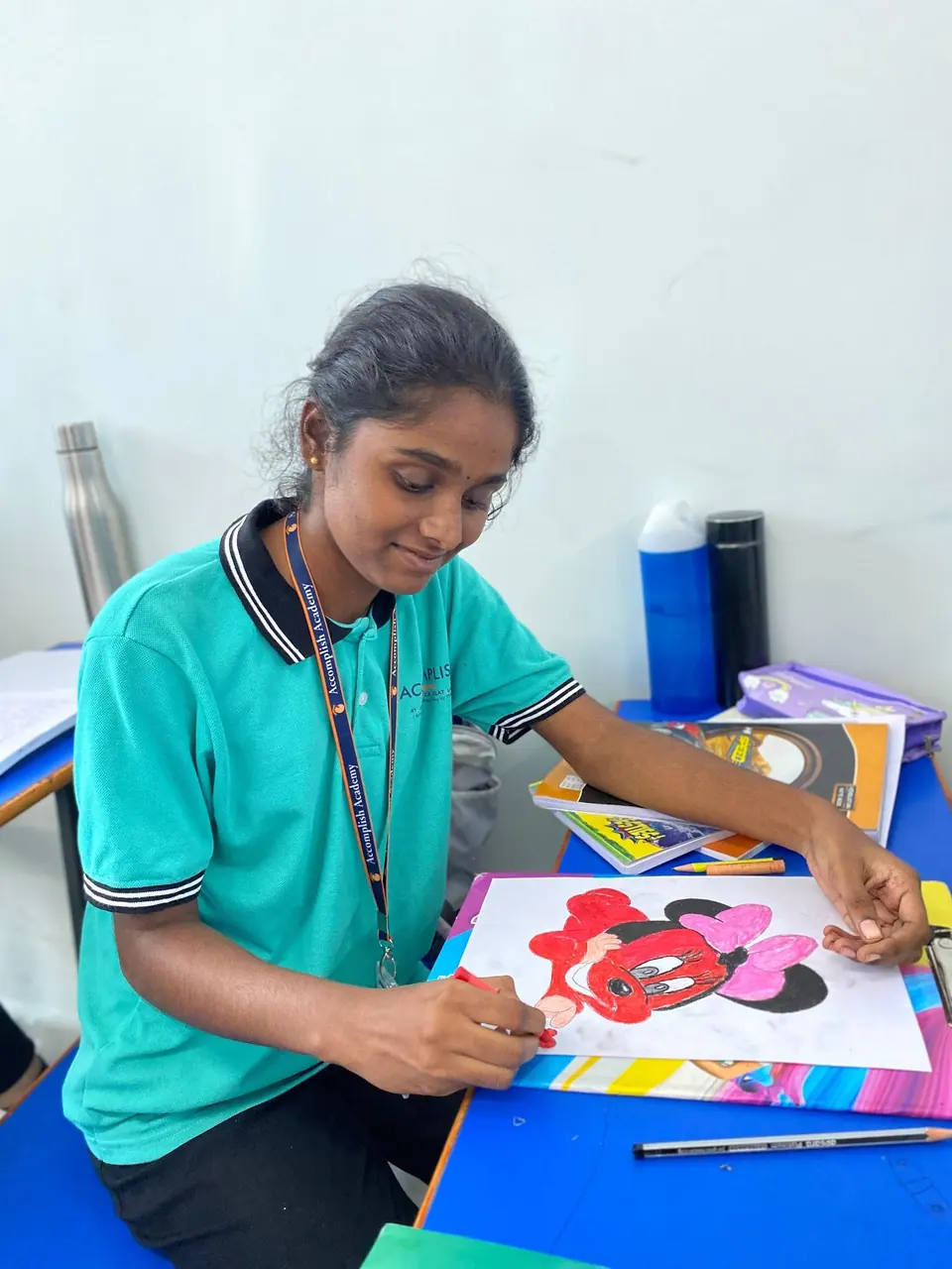 A student painting during an art activity