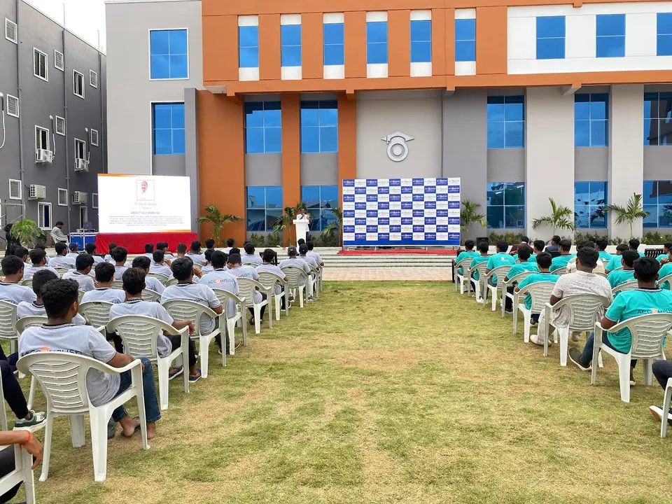 Students gathered on the lawn for an assembly