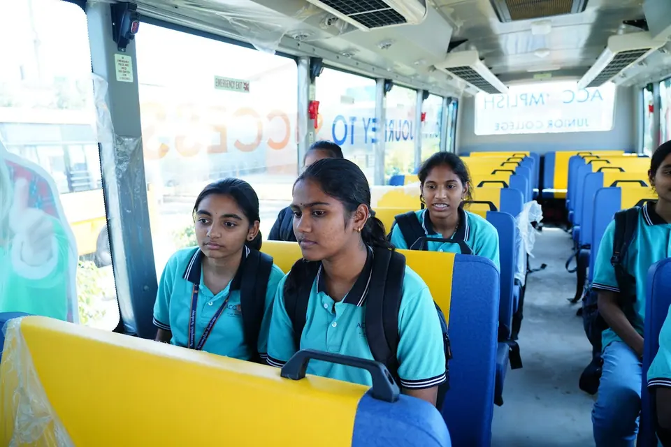Students seated inside an Accomplish bus