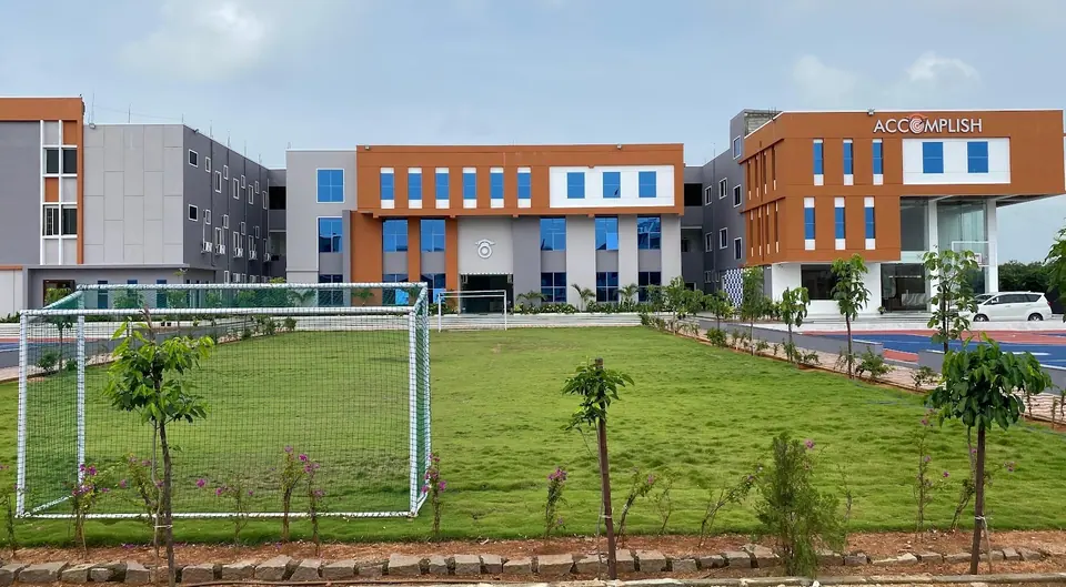 The football ground with the academic blocks behind
