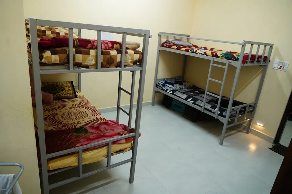 Bunk beds in a shared hostel room