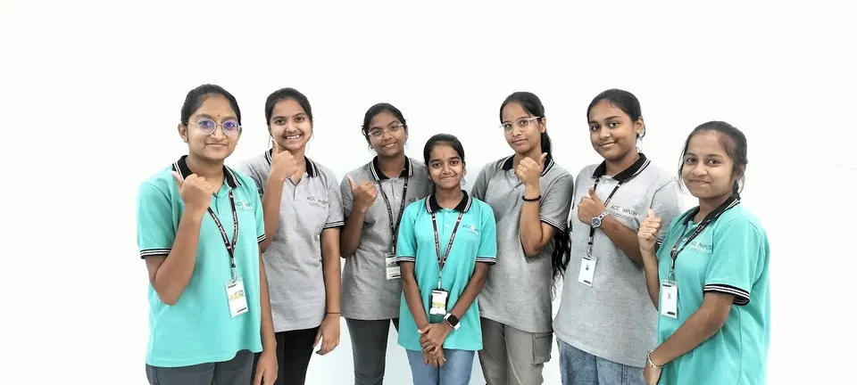 Students posing together in the classroom