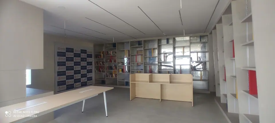 Bookshelves lining the library